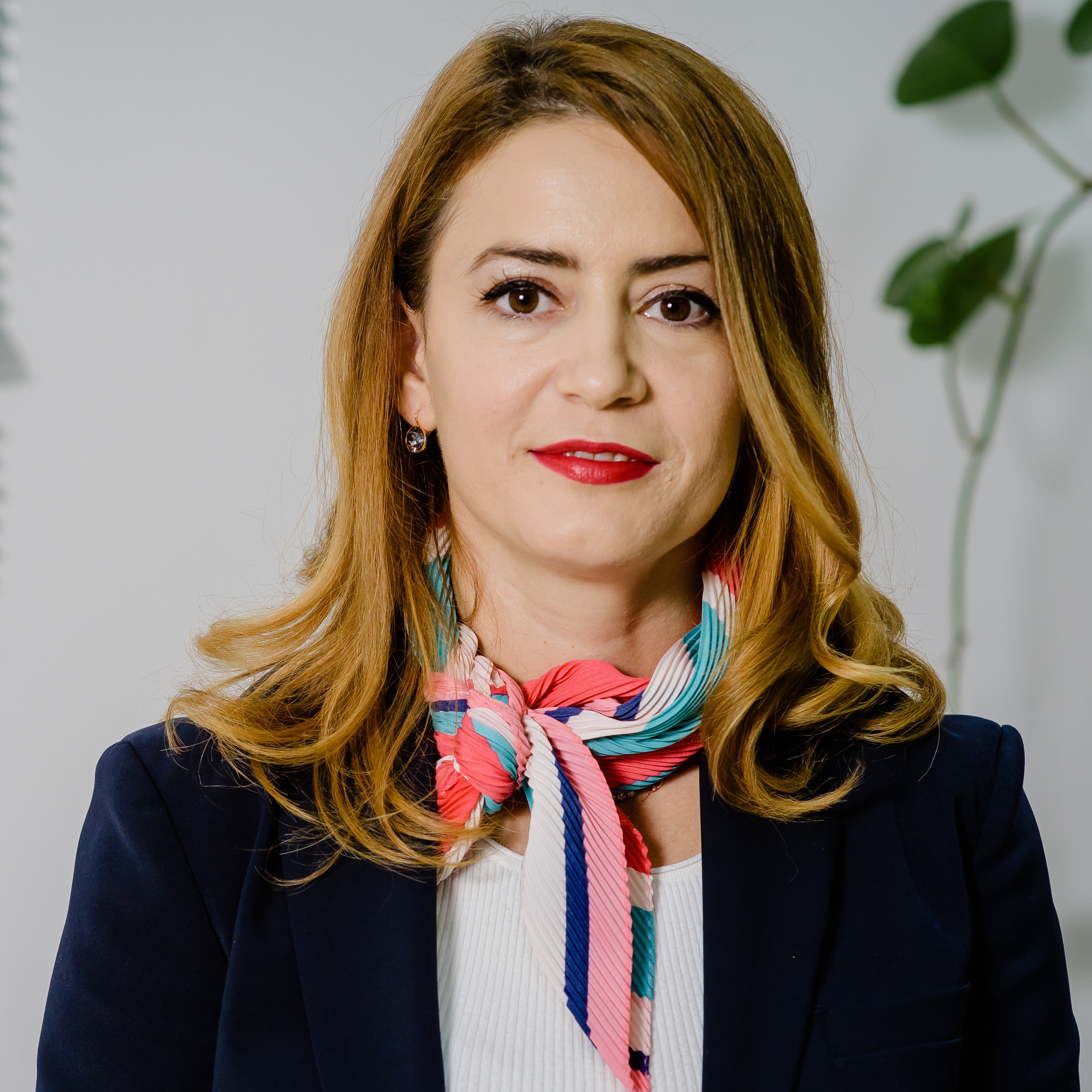 Blerina Memo | Tax Director