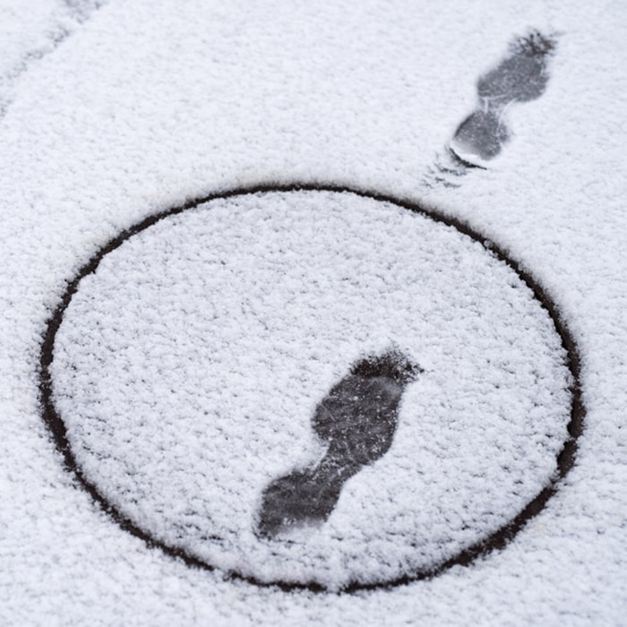 snowy footprints in a circle