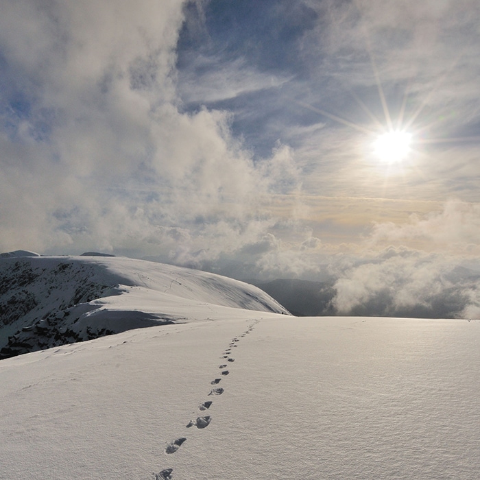 snowy mountain footprints