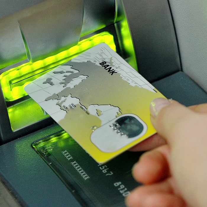 card going into an ATM machine