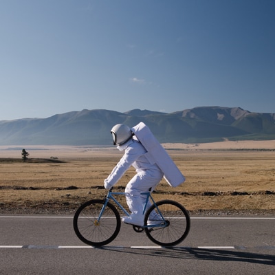 astronaut on a bike