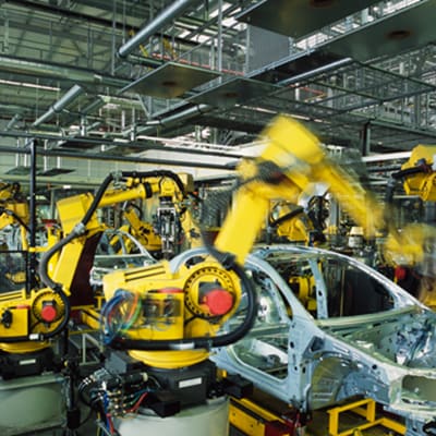 Yellow car manufacturing machine