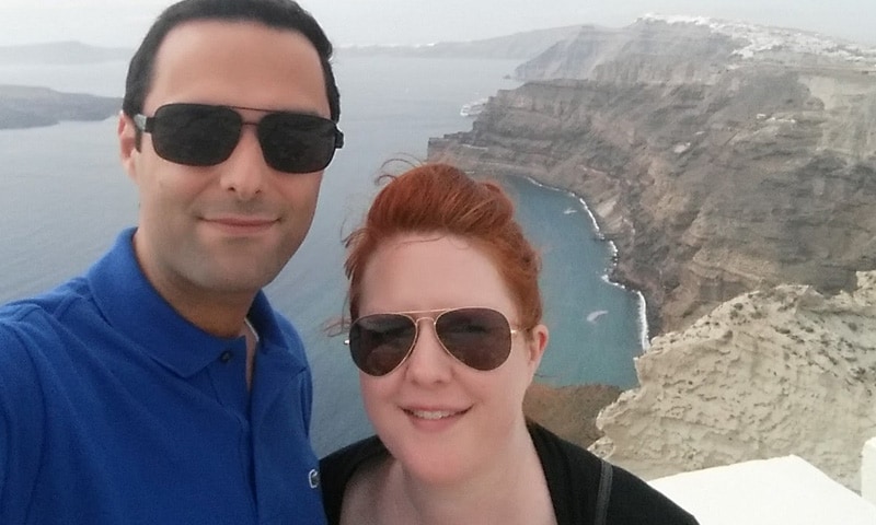 Carolyn and her husband enjoying the breathtaking mountain-top view