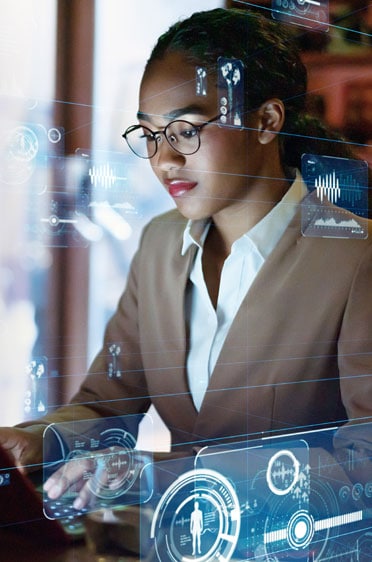 Young woman in office setting processing data